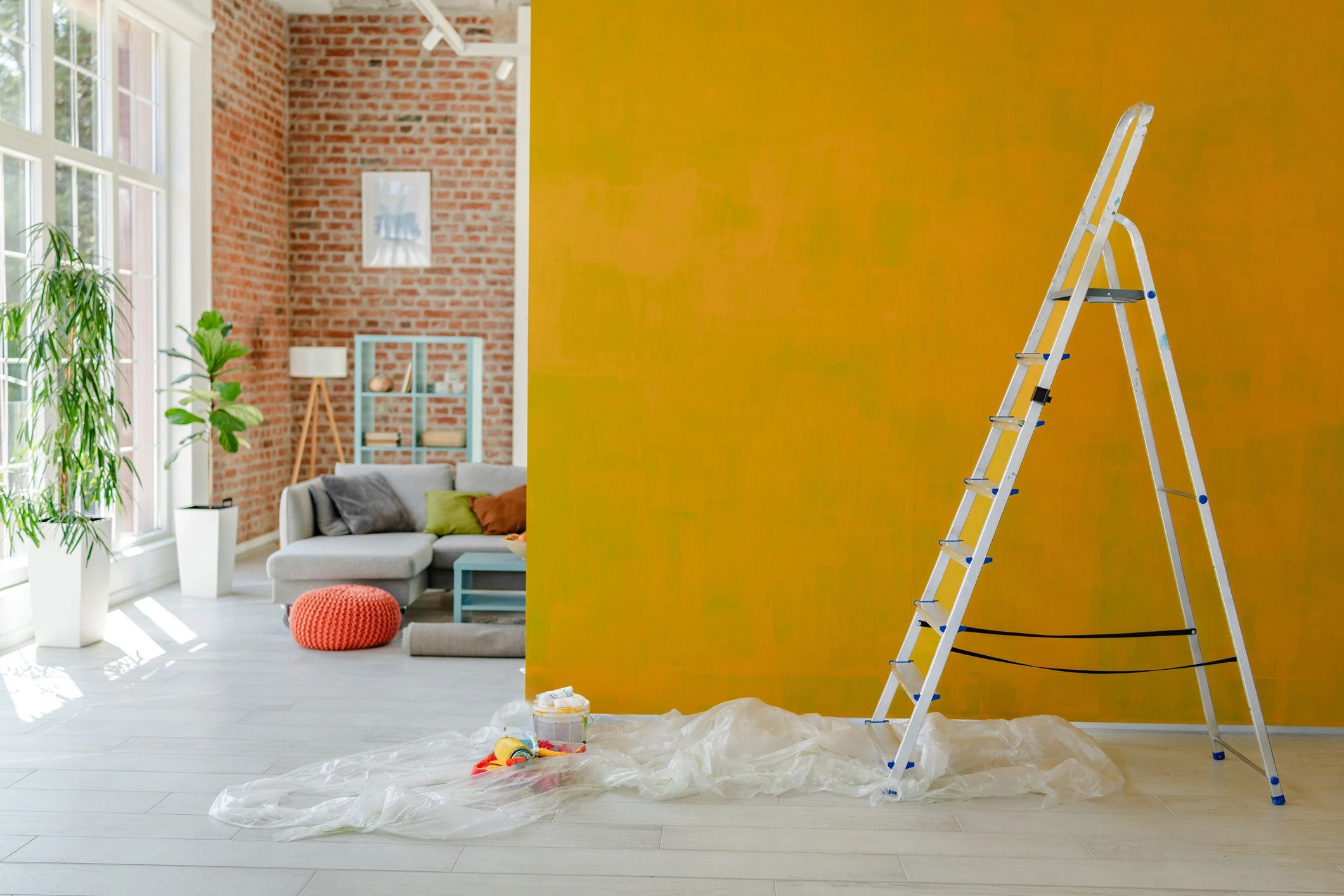 Home improvement tools and ladder in a living space